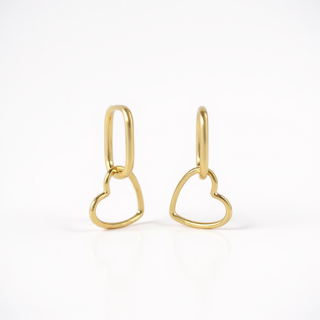 Boucles Heartbreaker Gold — créole ovale & charm cœur évidé amovible en argent 925 plaqué or 18k. 2 looks en 1 paire. Hypoallergéniques, résistantes à l'eau vue produit