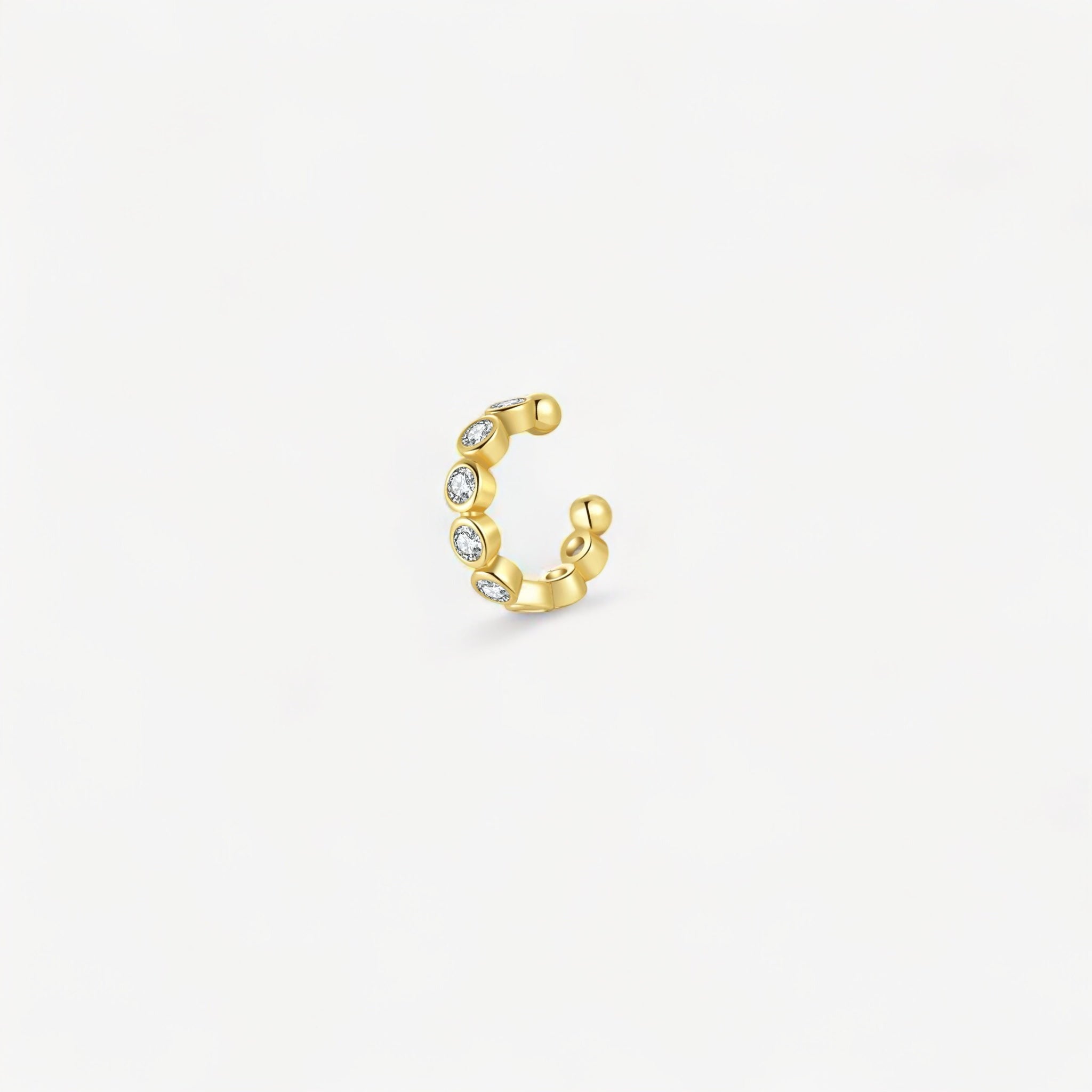 Ear Cuff Sparkle Gold — zircons grade 5A bezel en argent 925 plaqué or 18k. 9,5mm, sans piercing, hypoallergénique, résistant à l'eau. Éclat joaillerie instantané. Luxlab Collection