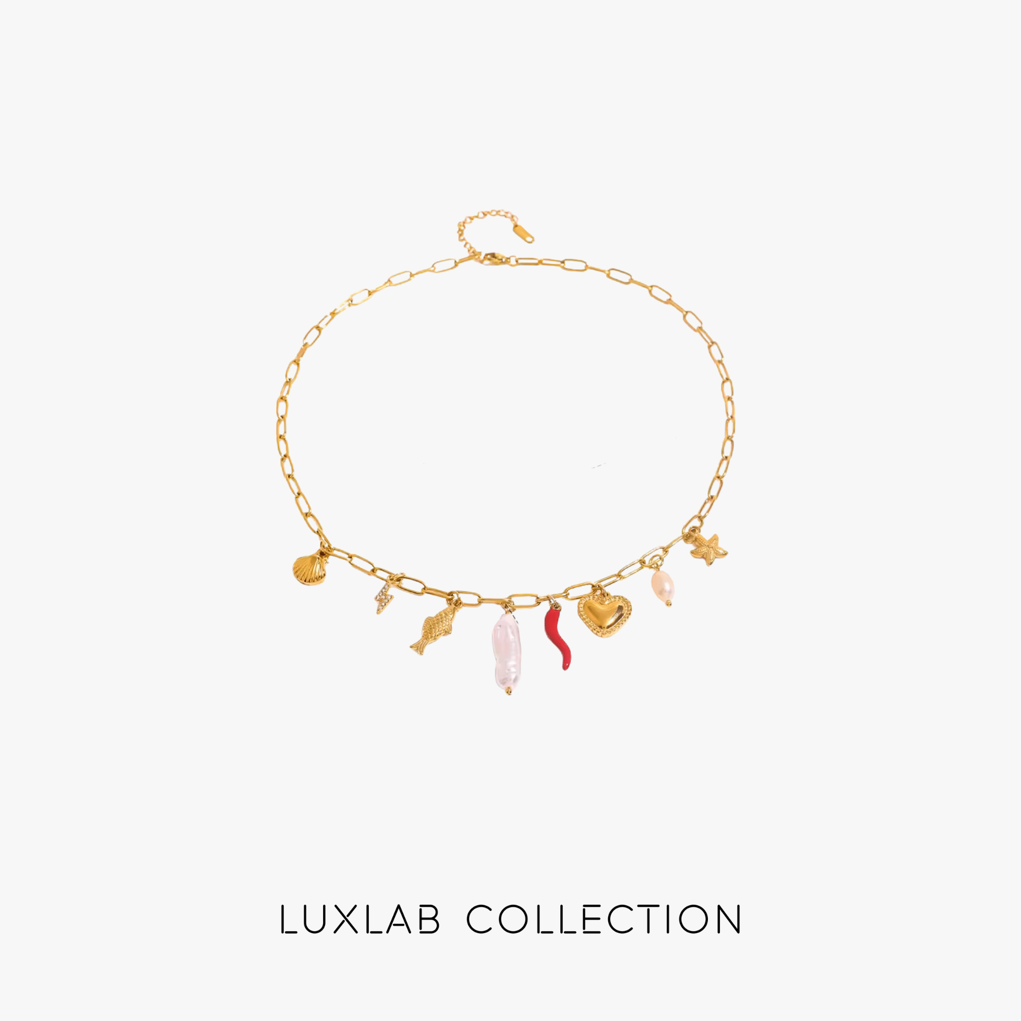 collier charm fever en acier inoxydable 316l pvd or 18k sur fond blanc luxlab collection