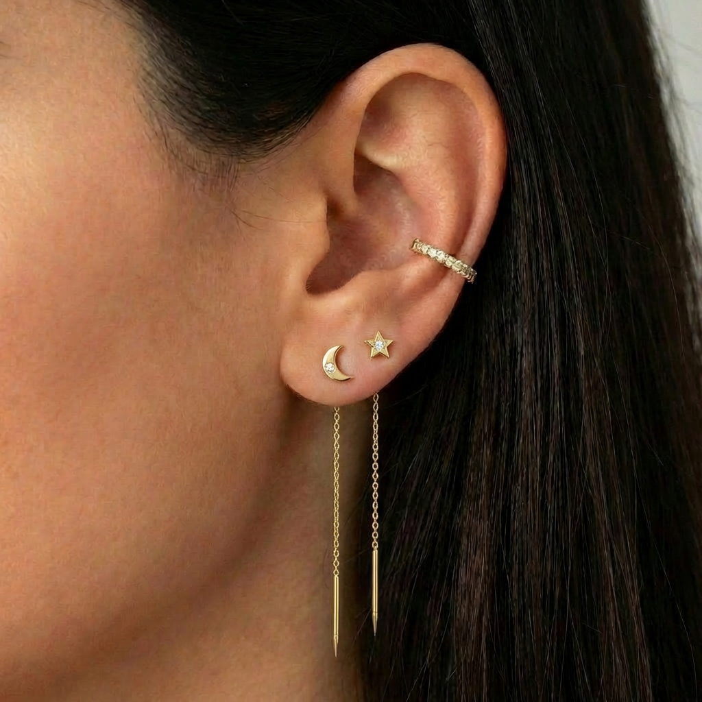 Leah Gold earrings — asymmetric moon & star threader with zirconia in 18k gold plated 925 silver. 48mm, water-resistant, hypoallergenic. Poetic & unforgettable.